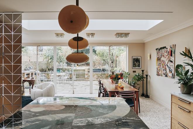 Looking out over the dining area of the Camden Kitchen with a view leading into the garden 