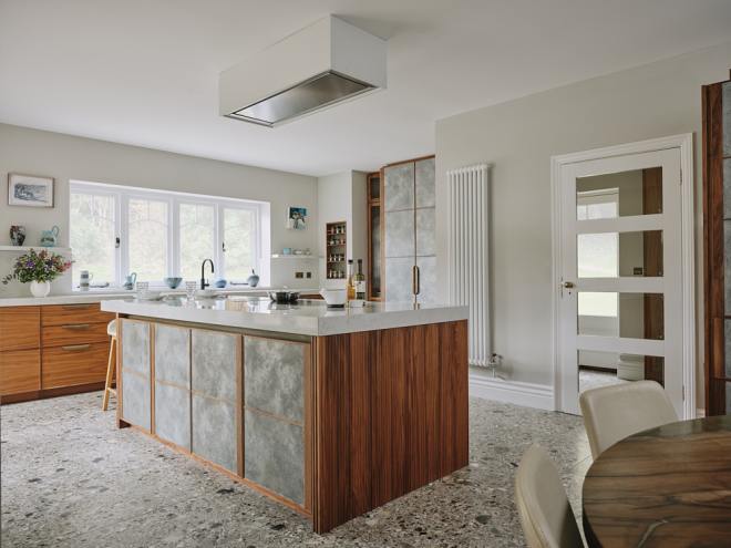 Photo of the new forest kitchen with large island with breakfast bar and separate dining area