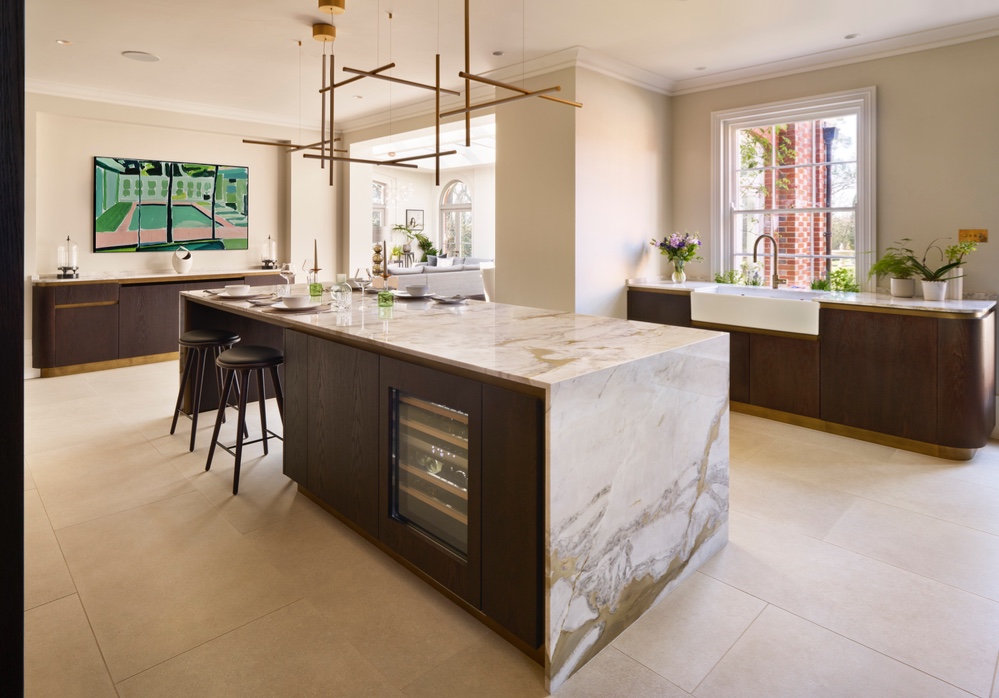 The Monte Cristo Oro Quartzite worktop waterfalls over each end of the island