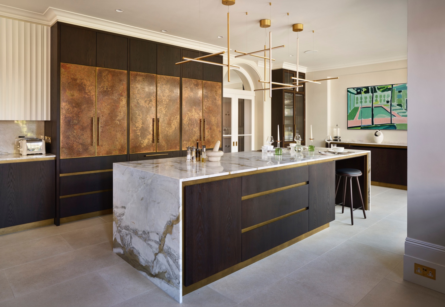 View of Sevenoaks dark stained oak island with marble counter 
