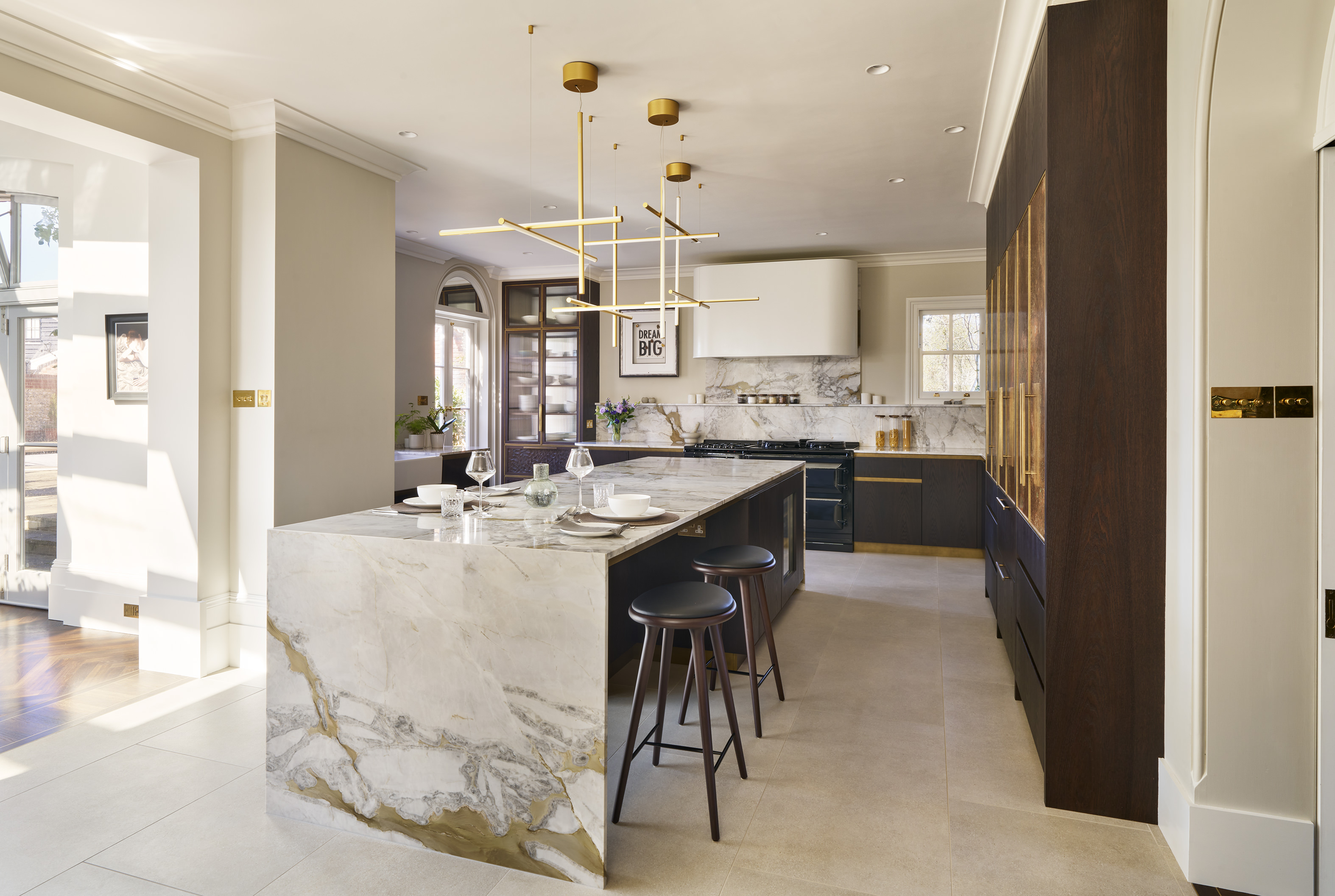Sevenoaks Kitchen flooded with light showing the featured waterfall marble island