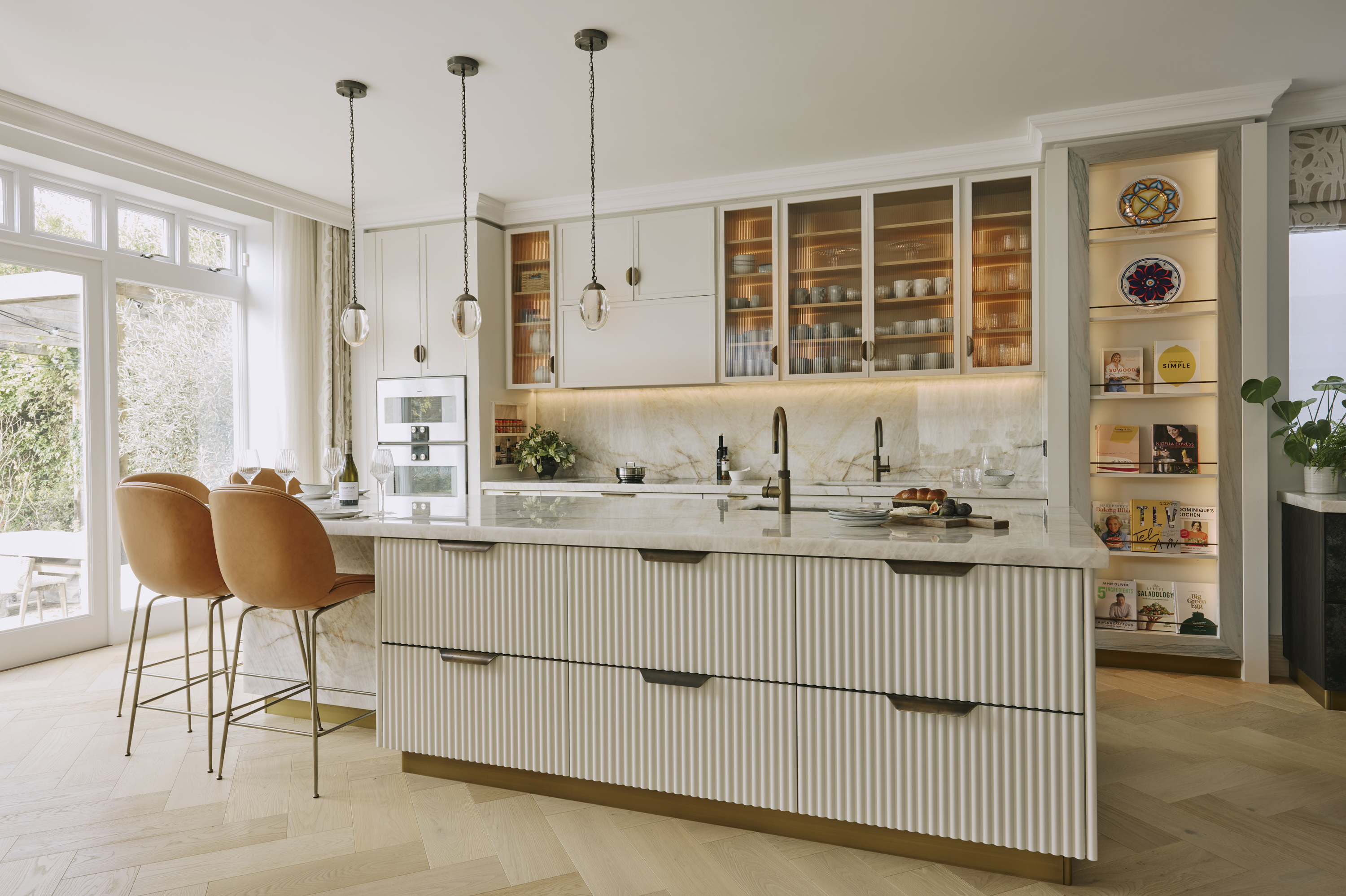 The Bruton kitchen in the Ledbury Shaker style featuring oak light painted cabinetry.