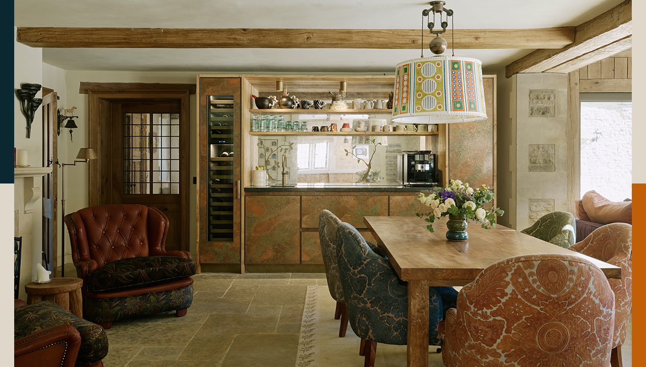 The copper fronted drinks and breakfast cupboard in the Cotswolds Kitchen.