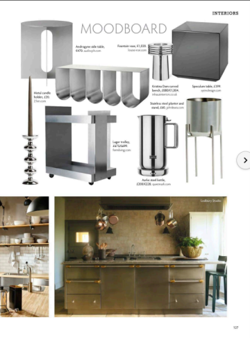 Magazine showing stainless steel island by Ledbury Studio